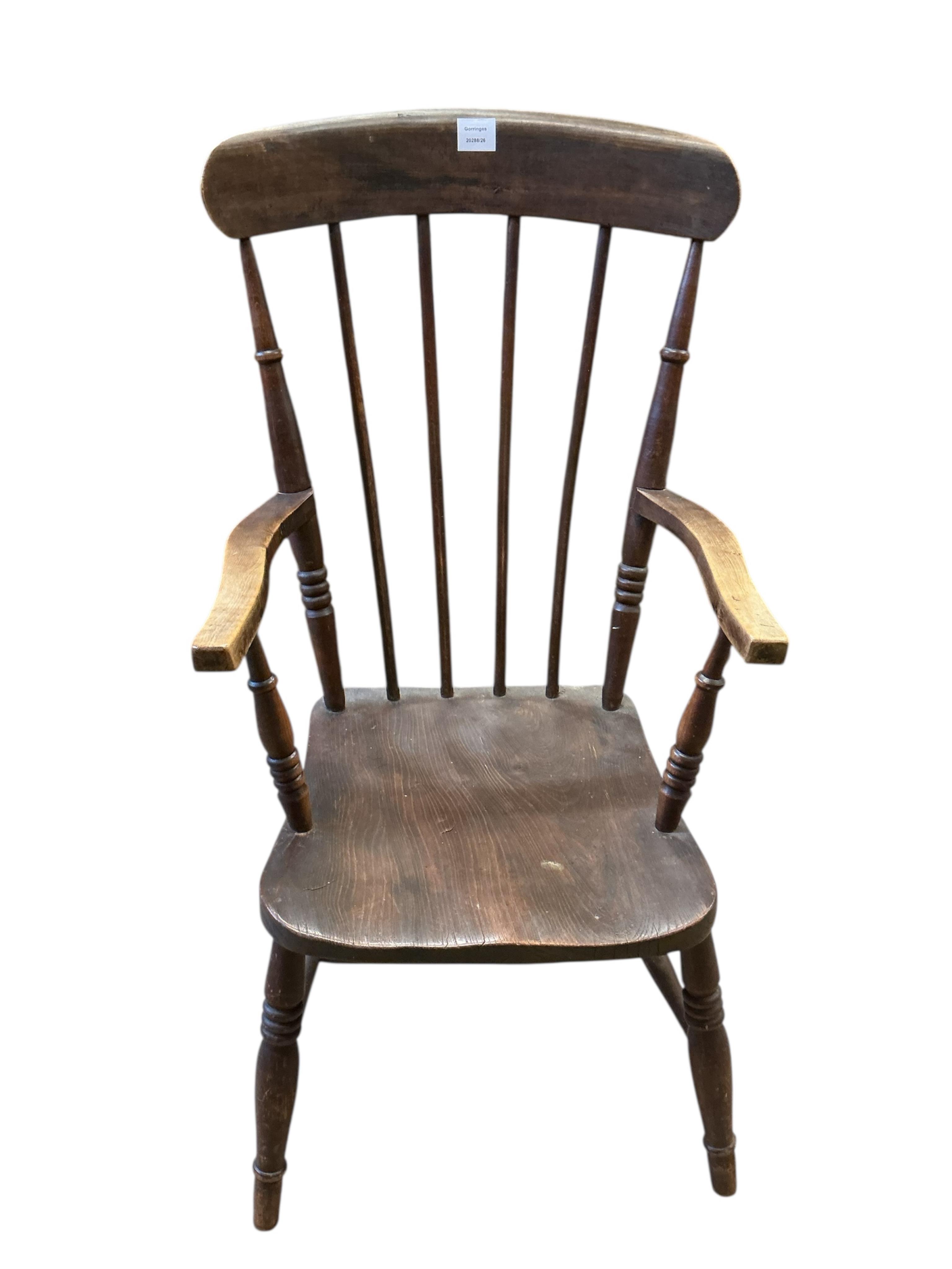 A Victorian elm and beech Windsor comb back armchair, width 49cm, depth 46cm, height 103cm